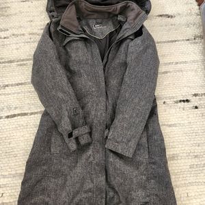 REI gray/black womans small raincoat. However it is missing the belt.